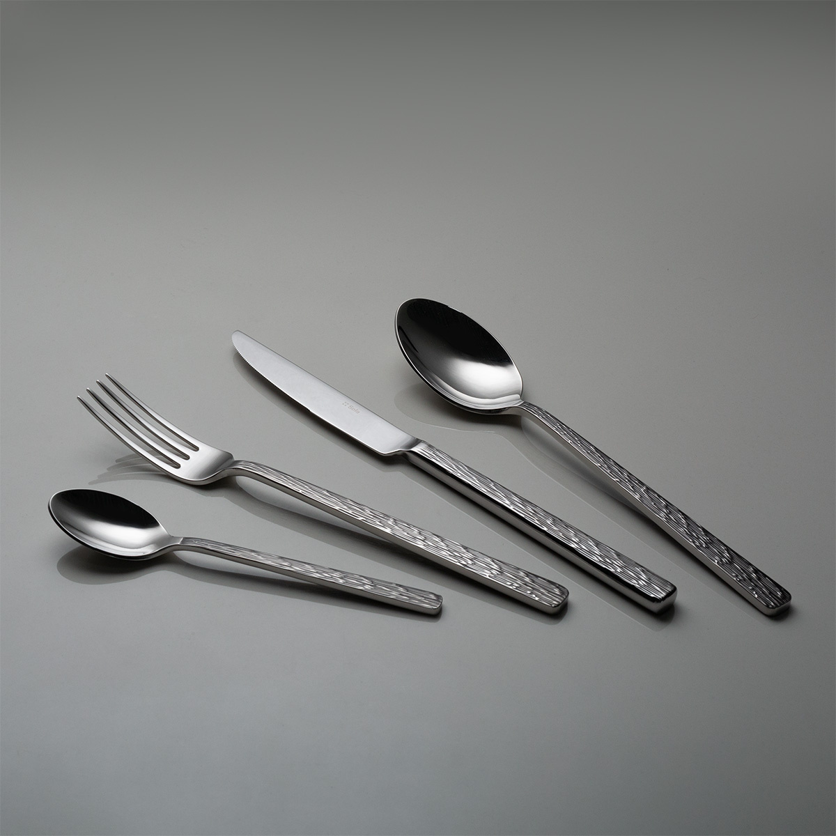 Besteckset 16-tlg. – Sardegna Waterfall Stiel graphit